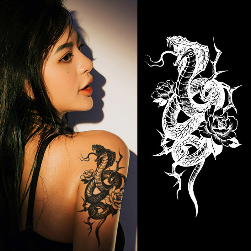 Close-up of cobra semi permanent tattoo on skin showing realistic detail.