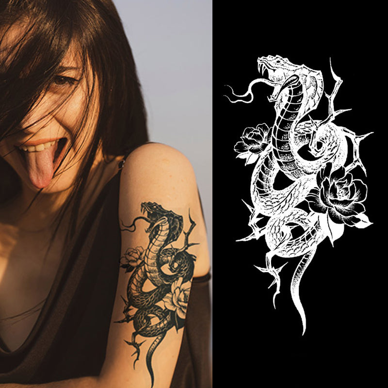 Close-up of cobra semi permanent tattoo on skin showing realistic detail.